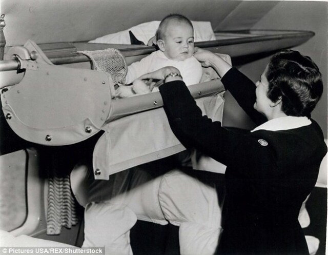 Just like today, parents in the early days of commercial aviation had to hold their babies during takeoff and landing for safety.