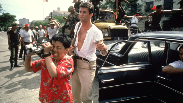 Mel Gibson in The Year of Living Dangerously (1982), delivering a gripping performance in the political thriller.