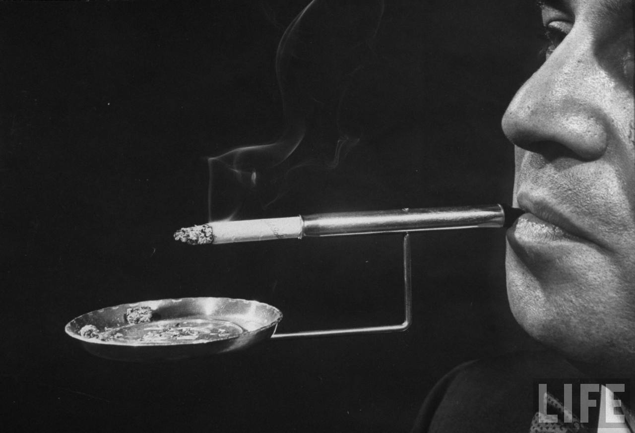 An ashtray holder – keeping your ashtray conveniently at hand wherever you go. (Photo by Joel Yale/LIFE magazine).