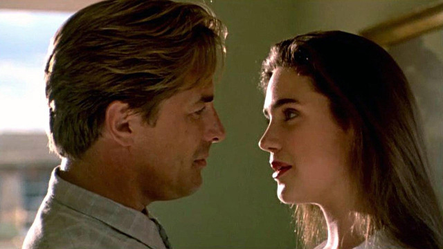 Intimate moments reveal the emotional undercurrents between Gloria and Harry, as Connelly’s expressive gaze conveys layers of longing and guarded vulnerability.