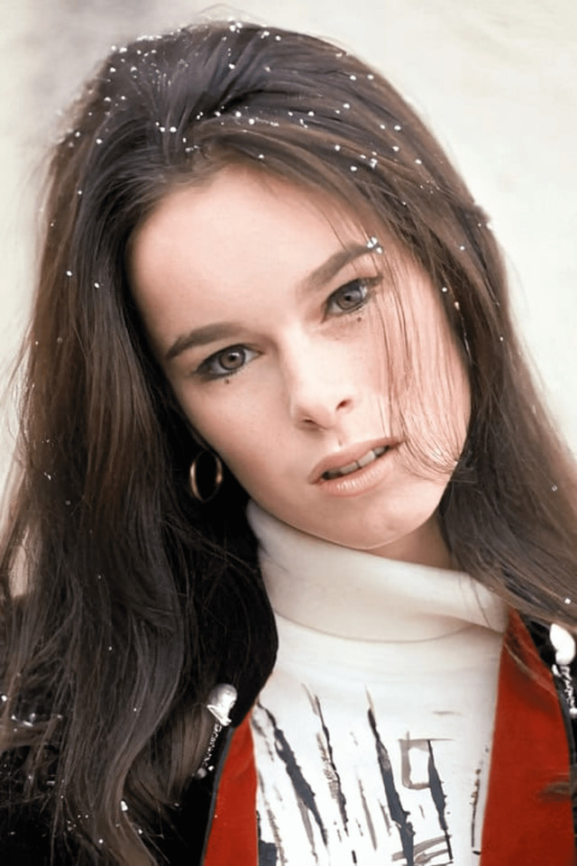 Snowflakes in her hair, Geraldine’s early portraits captured the quiet beauty and depth that defined her screen presence.
