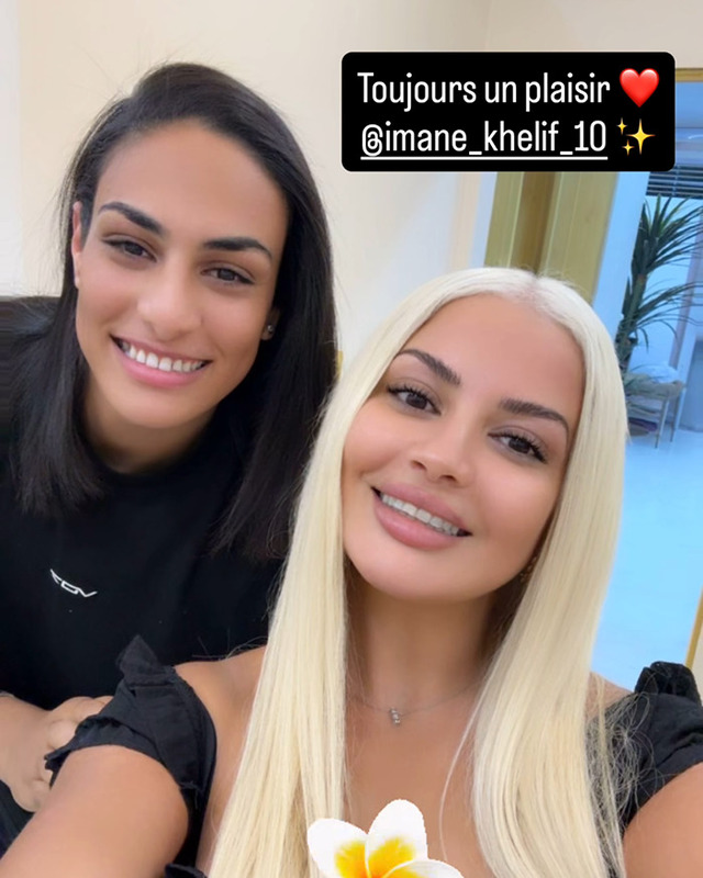 A glowing smile: Imane Khelif poses with a friend, embracing her softer, more feminine side.