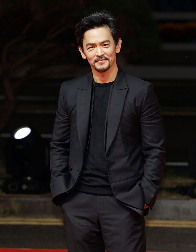 John Cho stays effortlessly youthful thanks to family focus, balance, and a calm lifestyle.