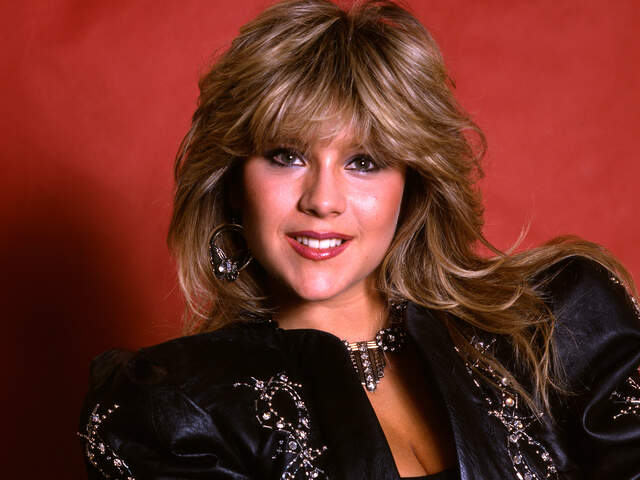 The look that defined an era—Samantha Fox in her prime, capturing the essence of ’80s pop culture.