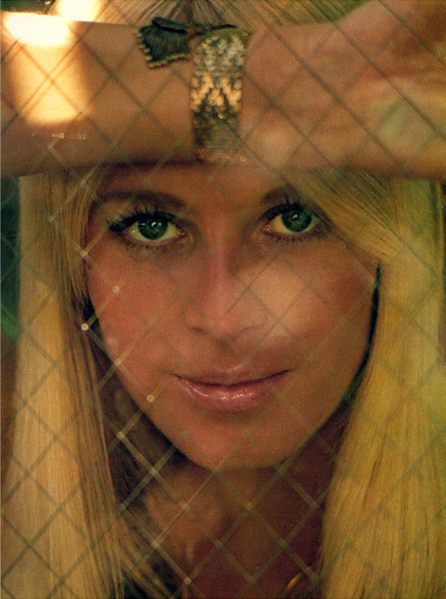 A soft and intimate image of Liv, her blonde hair framing her face with a subtle yet powerful gaze.