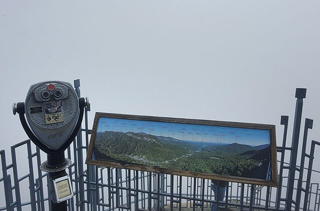 A hike in search of a beautiful view, but fog ruins everything.