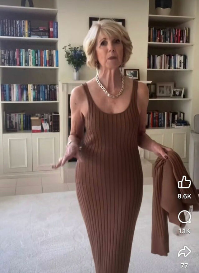 A snapshot from the viral video showing a stunning woman in her 70s facing harsh judgment for her attire.