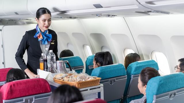 Air Canada’s crew on duty providing service and meals on board