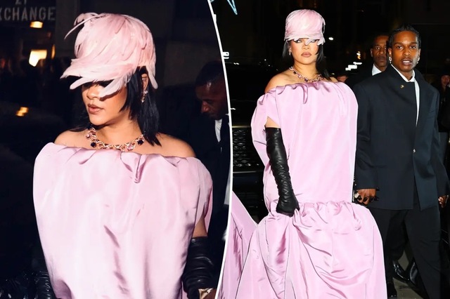 The dress was accessorized with a matching feathered hat, black gloves, and a purple necklace.