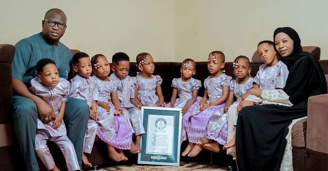 The first surviving nonuplets, beaming with joy, proudly holding their Guinness World Record certificate.