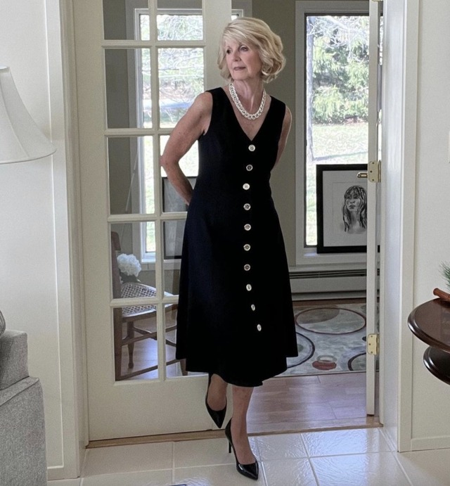 This image beautifully captures the grace and confidence of an older woman embracing modern fashion.