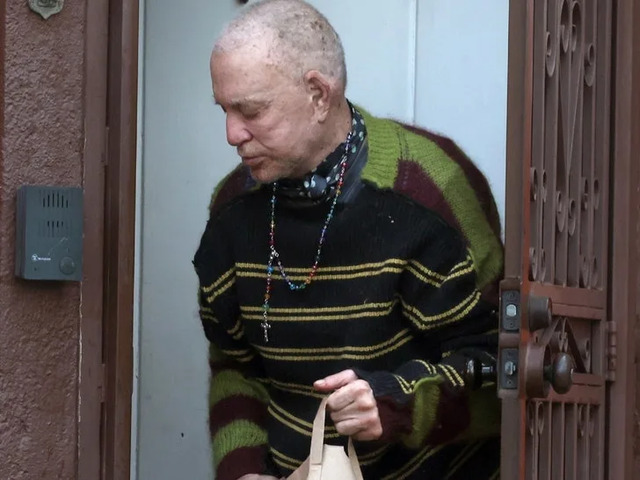 With a shaved head, thin frame, and eclectic outfit, including a multi-colored sweater and beaded rosary, Rourke looked far from his iconic roles in 9 ½ Weeks and The Wrestler.