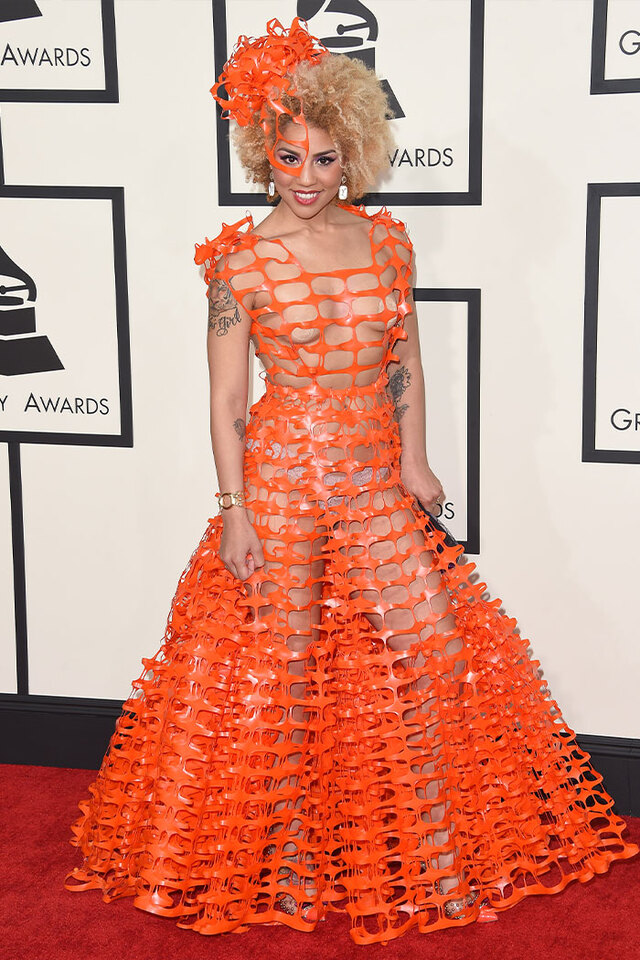 Joy Villa (2015) achieved viral fame by wearing a dress constructed entirely from orange plastic construction fencing.