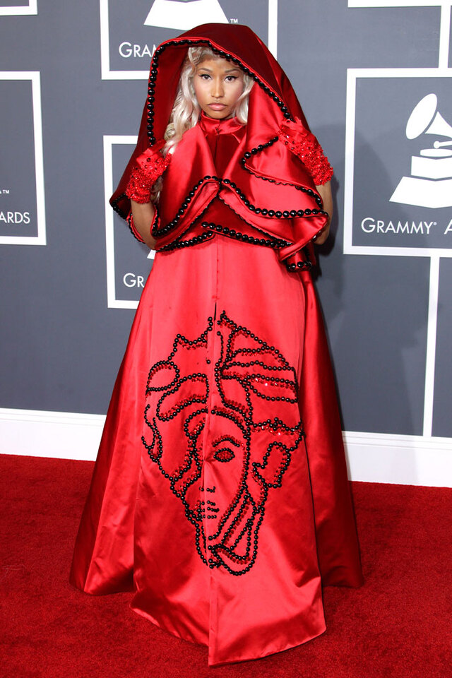 Nicki Minaj (2012) sparked controversy by arriving in a red Versace robe accompanied by a man dressed as the Pope.